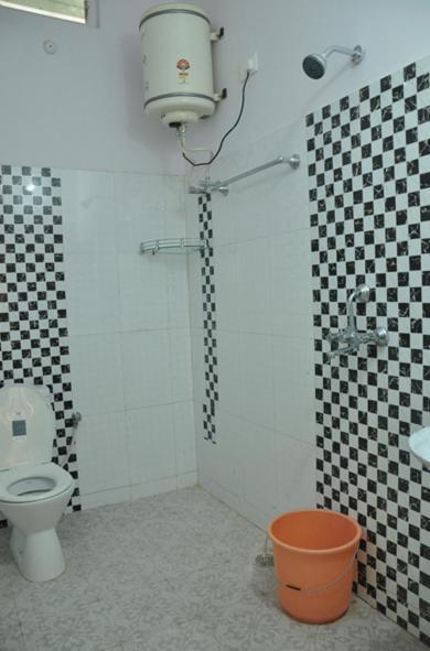 Hotel Kiran Palace Varanasi Oda fotoğraf